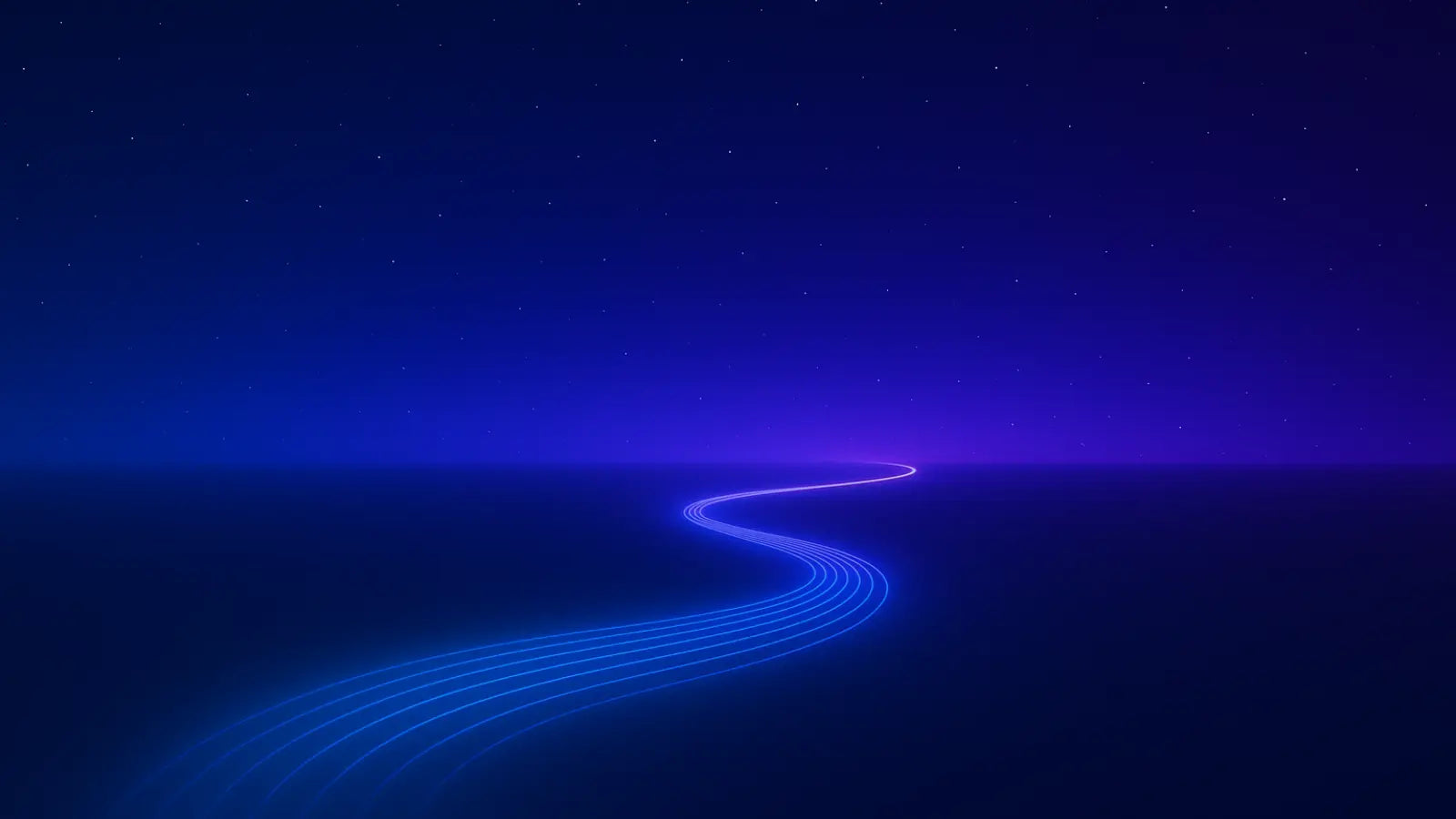 Winding road with glowing blue lights on a dark blue night sky.